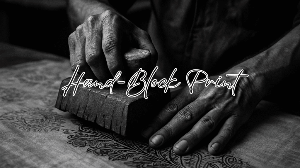 The hands of a local Indian artisan, crafting a hand-blocked print